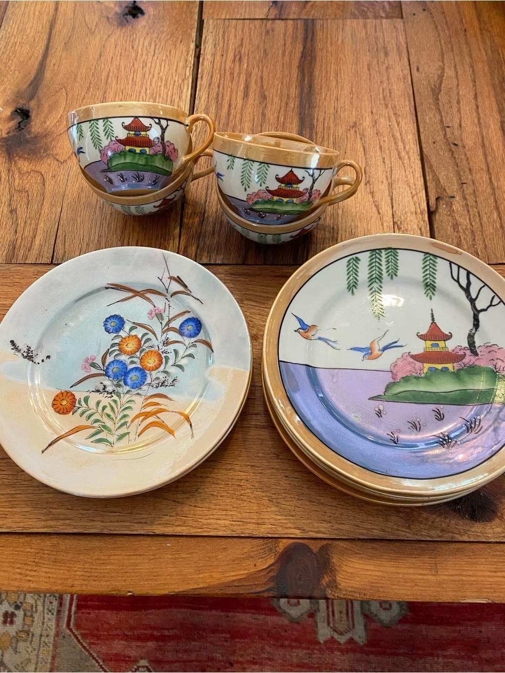 Hand-Painted Asian-Inspired Tea Cup and Saucer Set in Cream and Gold